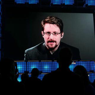 Edward Snowden lors d'une vidéoconférence en 2019. [Keystone - EPA/Miguel A.Lopes]