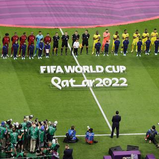 Les équipe du Qatar et de l'Équateur au Mondial 2022. [EPA/Keystone - Ronald Wittek]