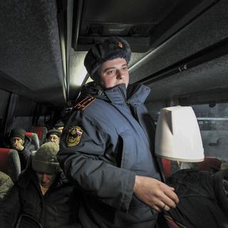 Des habitants de Marioupol évacués de la ville le 15 mars 2022. [Keystone - Arkady Budnitsky]