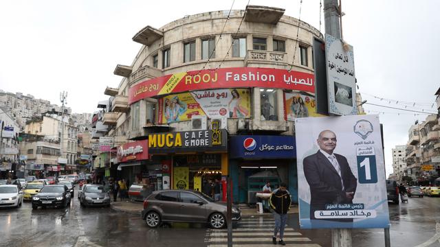 Une pancarte électorale dans la ville de Naplouse en Palestine. [EPA - Alaa Badarneh - Keystone]