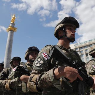 Des combattants géorgiens rejoignent le camp de l'Ukraine pour défaire la Russie. [EPA - Zurab Kurtsikidze]