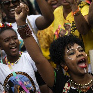 Une manifestation de femmes noires contre le racisme et les inégalités sociales à Rio de Janeiro, le 31 juillet 2022. [AP/Keystone - Bruna Prado]