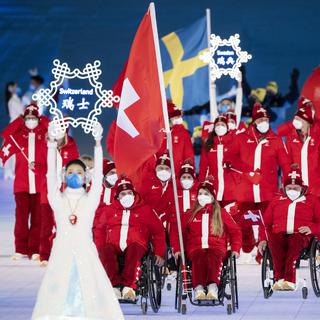 Vendredi 4 mars: l'entrée de l'équipe de Suisse pendant de la cérémonie d'ouverture des Jeux paralympiques de Pékin, qui se dérouleront pendant neuf jours. [Keystone - Ennio Leanza]