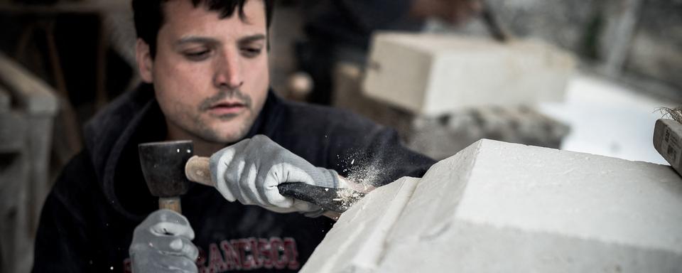 Berzy-le-Sec, dans l’Aisne, valorisation du travail de jeunes engages pour la protection et la renovation du patrimoine auprès des associations REMPART et ASPAM. Ici, le château et l'église romane de Berzy-le-Sec, le 24 Avril 2019. [Hans Lucas via AFP - Arthur Nicholas Orchard]