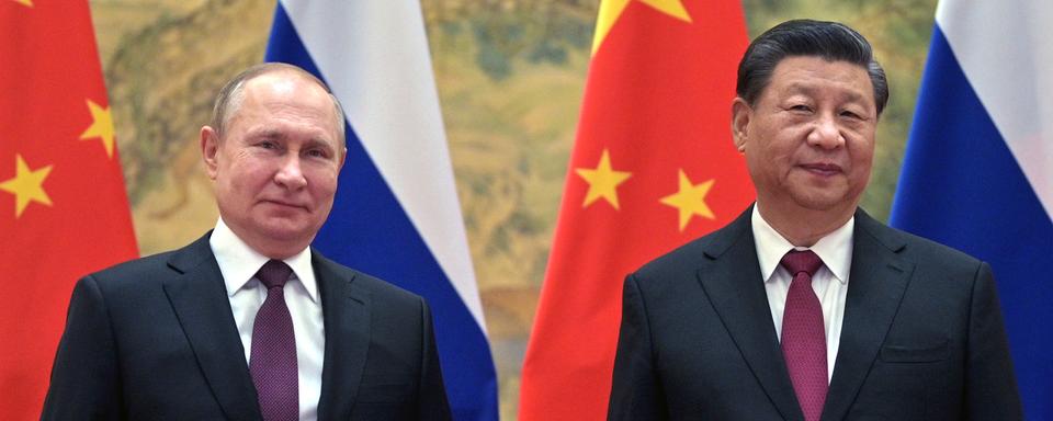 Vladimir Poutine et Xi Jinping photographiés le 4 février 2022 à Pékin. [Keystone/AP - Alexei Druzhinin]