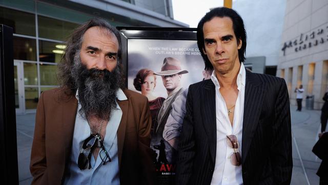 Warren Ellis et Nick Cave à la première du film "Lawless" le 22 août 2012 à Hollywood. [AFP - KEVORK DJANSEZIAN]