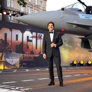 Tom Cruise pose pour les médias lors de la première britannique de 'Top Gun Maverick' dans un cinéma du centre de Londres, le jeudi 19 mai 2022. [AP Photo/KEYSTONE - Alberto Pezzali]