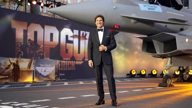 Tom Cruise pose pour les médias lors de la première britannique de 'Top Gun Maverick' dans un cinéma du centre de Londres, le jeudi 19 mai 2022. [AP Photo/KEYSTONE - Alberto Pezzali]