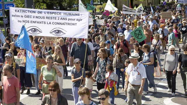 Une marche en faveur du climat à Lausanne (VD), le 3 septembre 2022. [Keystone - Salvatore Di Nolfi]