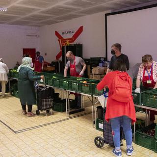 Une association distribue de la nourriture à Berlin. [Keystone - Christophe Gateau]