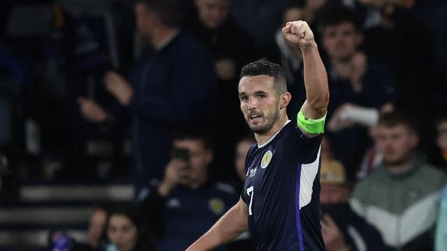 Le capitaine écossais John McGinn célébrant son but. [Russell Cheyne]