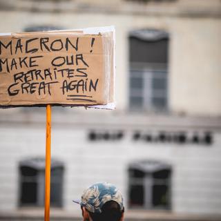 La politique des retraites d'Emmanuel Macron a été l'un des points de crispation du premier mai en France. [AFP - Hans Lucas]