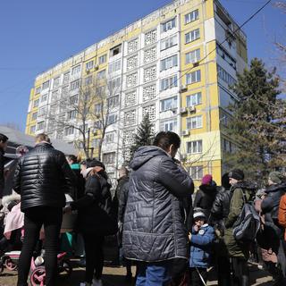 Des réfugiés ukrainiens à Chisinau, la capitale de la Moldavie. [EPA/Keystone - Amel Pain]