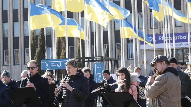 Une manifestation en soutient à l'Ukraine en Lettonie. [Keystone - EPA/Toms Kalnins]