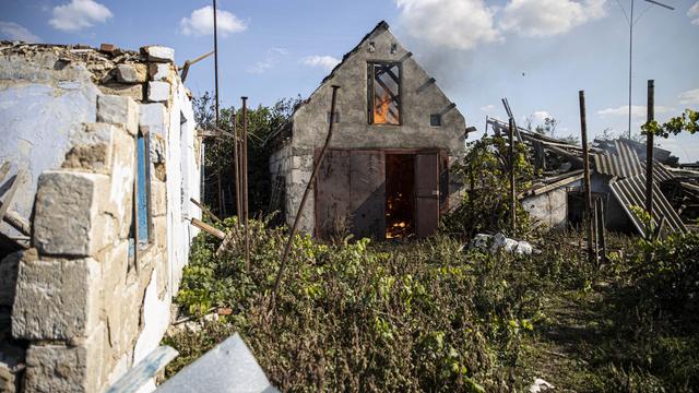 Un village dans la région de Kherson repris par les forces ukrainiennes, le 7 octobre 2022. [Keystone - Metin Aktas]