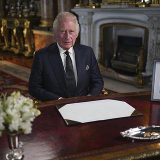 Le roi Charles III pour sa première adresse à la nation, depuis le palais de Buckingham, le 9 septembre 2022. [Keystone - Yui Mok/Pool Photo via AP]