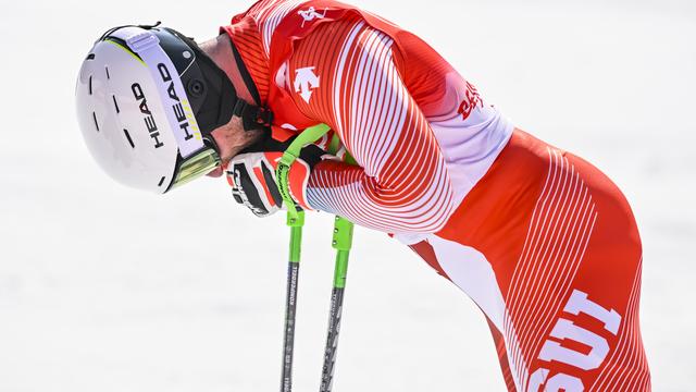 Justin Murisier après le slalom du combiné des Jeux olympiques de Pékin. [Keystone - Jean-Christophe Bott]