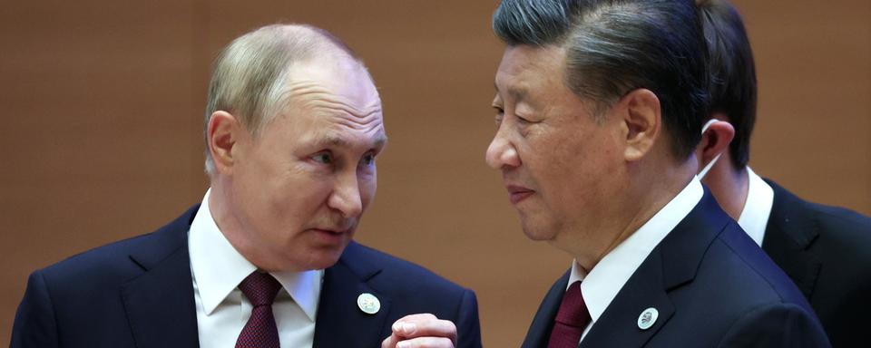 Vladimir Poutine et Xi Jinping se sont retrouvés lors du sommet de l’OCS en Ouzbékistan en septembre. [Keystone - Sergei Bobylev]