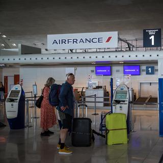 Des dizaines de vols annulés à l'aéroport de Roissy à cause de grèves. [Keystone - Christophe Petit Tesson]
