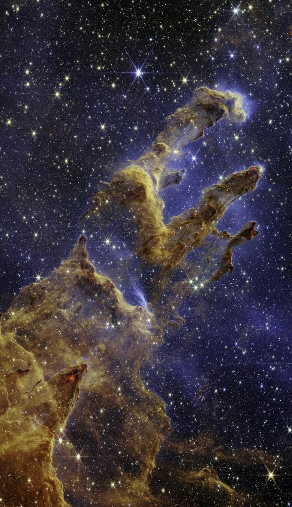 Les Piliers de la Création, considérés comme une pouponnière à étoiles, sont remplis de gaz et de poussière. [AFP - NASA/ESA/CSA]