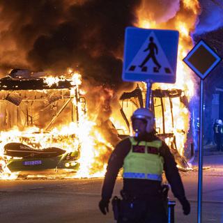 Des affrontements violents en Suède ont fait trois blessés par balle. [AP - Johan Nilsson]