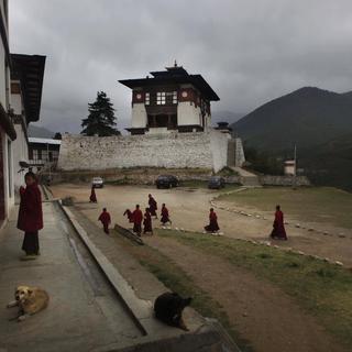 Des moines bouddhistes au Bhoutan. [Keystone - Manish Swarup/AP Photo]