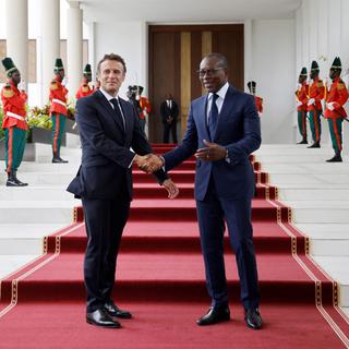 Emmanuel Macron reçu à Cotonou par le président du Bénin Patrice Talon, 27.07.2022. [AFP - Ludovic Marin]