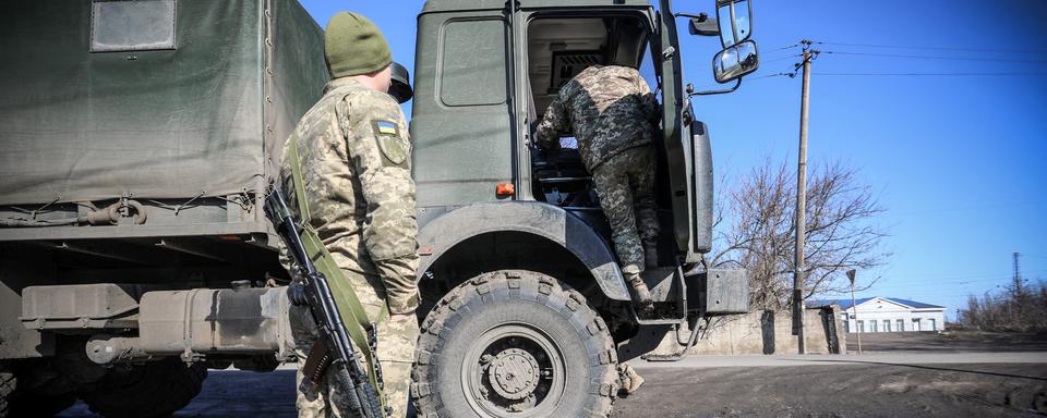 Un soldat ukrainien à Avdivka, le 21 février 2022. [AFP - Aleksey Filippov]