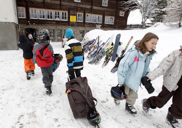 Camp de ski d'une école zurichoise à Davos. [Keystone - Arno Balzarini]