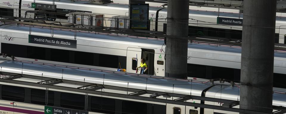 Des trains à la gare madrilène d'Atocha. [Keystone/AP Photo - Paul White]