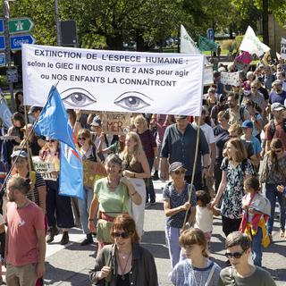 Une marche en faveur du climat à Lausanne (VD), le 3 septembre 2022. [Keystone - Salvatore Di Nolfi]