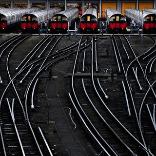 Des métros en gare à Londres le 19 août 2022. [AP/Keystone - Frank Augstein]