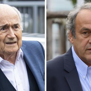 Sepp Blatter et Michel Platini vont être jugés en Suisse pour escroquerie. [Keystone - AFP]