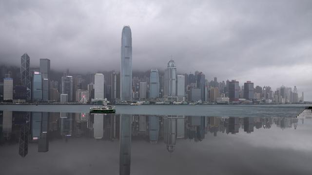 L'île de Hong Kong sous les nuages. [Keystone - EPA/JEROME FAVRE]