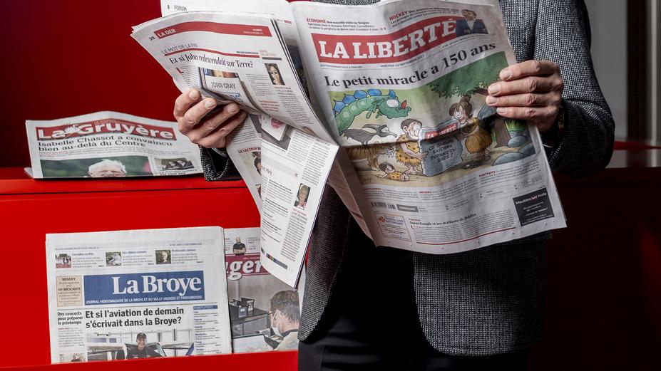 Les médias fribourgeois devront se débrouiller sans aides de l’Etat [Keystone - Jean-Christophe Bott]