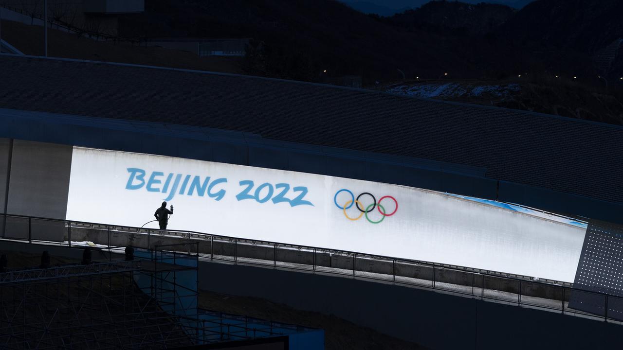 Quelque 250 ONG appellent les athlètes et les entreprises à renoncer aux Jeux de Pékin. [Keystone/AP - Jae C. Hong]