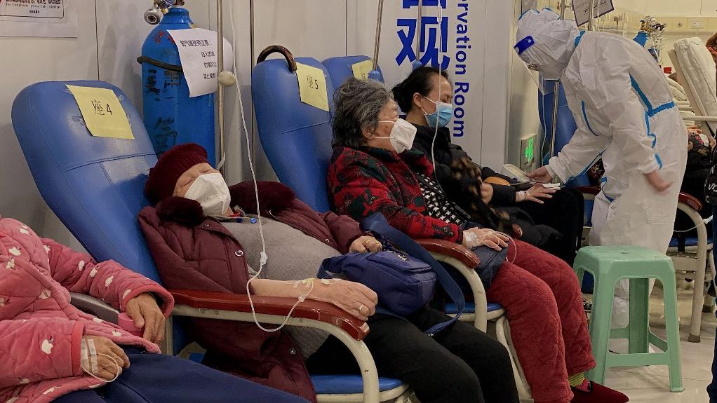 Un demi-million de personnes sont infectées par le coronavirus tous les jours dans la seule ville chinoise de Qingdao, a rapporté un responsable municipal de la santé. [AFP - Noel CELIS]