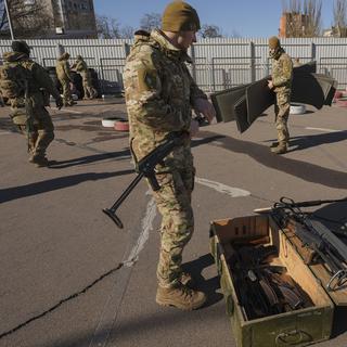 Des membres de la brigade Azov. [AP Photo/Keystone - Vadim Ghirda]