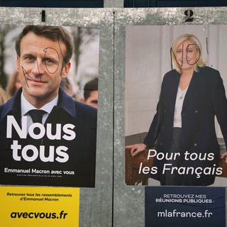 Emmanuel Macron et Marine Le Pen. [AP Photo/KEYSTONE - Bob Edme]