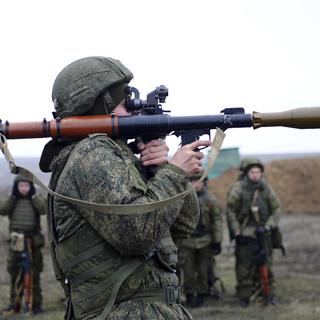 Troupes russes en exercice près de Rostov (sud), le 14.12.2021. [AP/Keystone]