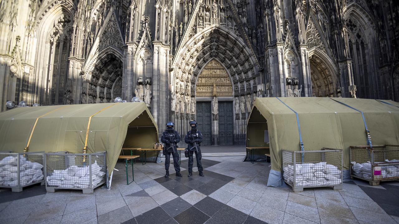 Trois arrestations en lien avec un projet d'attentat à Cologne. [Keystone - Thomas Banneyer]