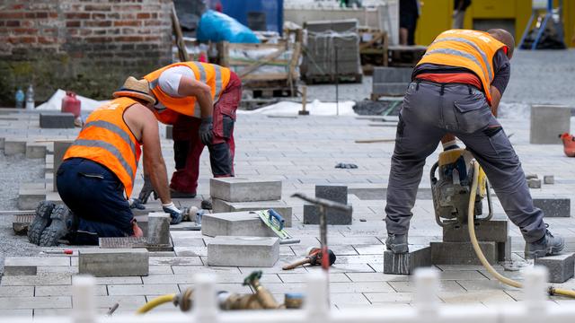 Travail.Suisse demande des hausses de salaire pour tous les travailleurs. [Keystone/DPA - Sven Hoppe]