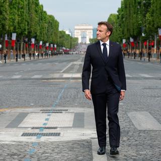 Emmanuel Macron sur les Champs Elysées pour le défilé 14 juillet [EPA/Keystone - Gonzalo Fuentes]