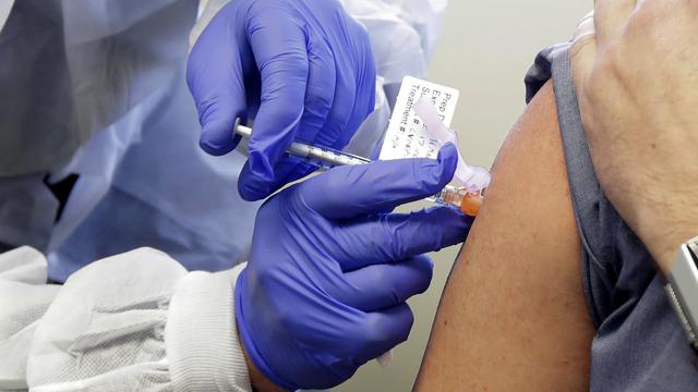 La campagne de vaccination est de retour dans les cantons de Vaud, Genève et du Valais (image d'illustration). [AP Photo / Keystone - Ted S. Warren]