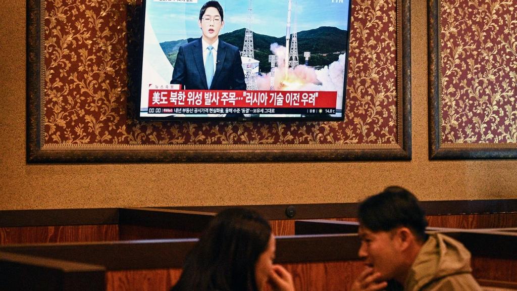 La Corée du Nord affirme avoir lancé avec succès un satellite de surveillance. [AFP - ANTHONY WALLACE]