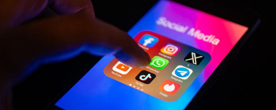 A close-up of a finger is pointing to the TikTok mobile app on a smartphone screen, which is displayed alongside other apps including Instagram, Telegram, Facebook, Tinder, YouTube, and Messenger, in Brussels, Belgium, on November 30, 2023. (Photo by Jonathan Raa/NurPhoto)
Jonathan Raa / NurPhoto / NurPhoto via AFP [AFP - Jonathan Raa]