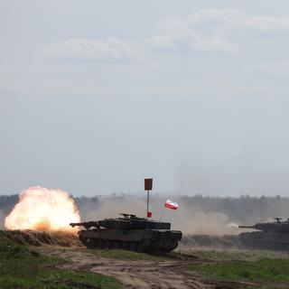 Des chars Leopard 2PL de l'armée polonaise lors d'un exercice de l'Otan, à Orzysz, en Pologne, le 24 mai 2022. [REUTERS - Kacper Pempel]