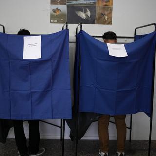 Les Grecs appelés aux urnes pour des législatives à l'issue incertaine. [Keystone - AP Photo/Thanassis Stavrakis]