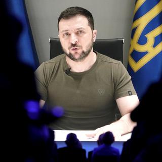 Le président ukrainien Volodymyr Zelensky s'adressera par vidéo au Parlement le jeudi 15 juin à 14h00 en marge de la session. [Keystone - Markus Schreiber - AP Photo]