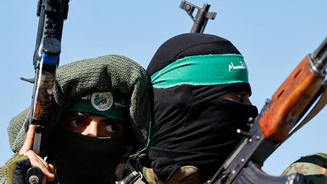 Des combattants palestiniens de la branche armée du Hamas participent à un défilé militaire le 19 juillet 2023 (image d'illustration). [reuters - Ibraheem Abu Mustafa]